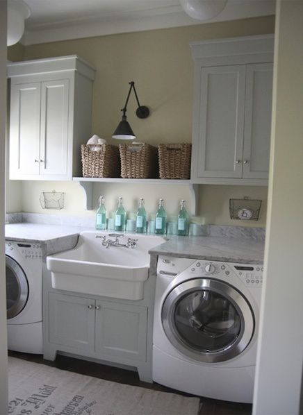 Laundry Room: Like the idea of the division of the Washer N Dryer with a sink. Would this work in my NEW redesigned Laundry Room?
